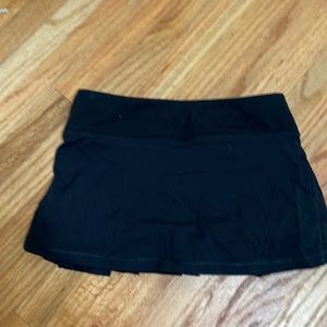Black ivivva skirt with build in shorts size 4